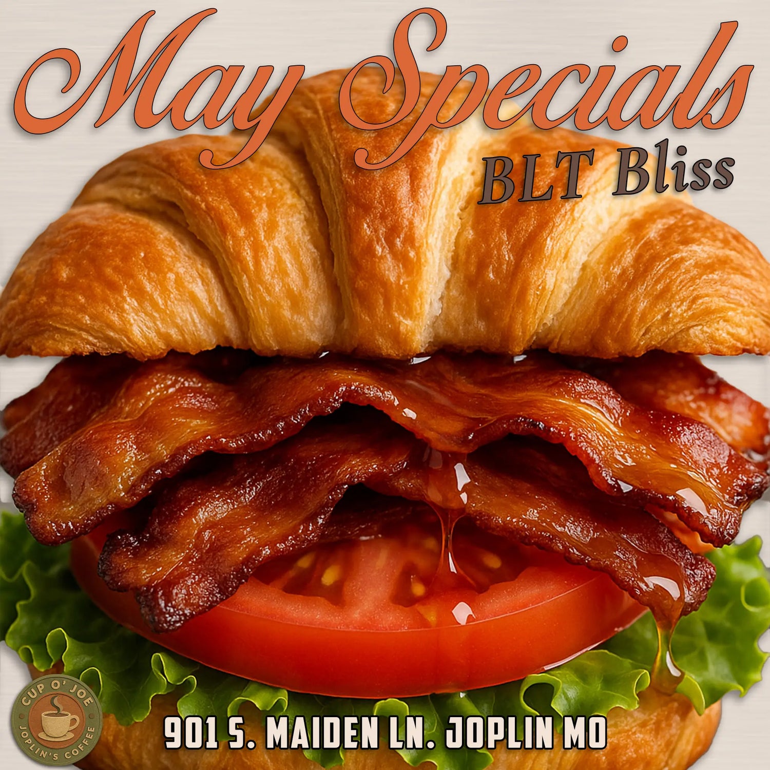 Close-up image of the BLT Bliss sandwich from Cup O Joe’s May menu. Features crispy bacon layered over fresh tomato and lettuce on a golden croissant, with maple drizzle visibly dripping onto the tomato. Text reads: May Specials – BLT Bliss. 901 S. Maiden Ln. Joplin MO.